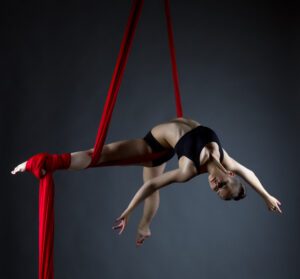 elegant girl doing an acrobatic move